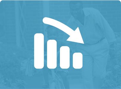 Icon of a downward trend in a bar chart with a blurred background.