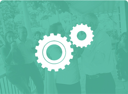 Icon of two gears with a blurred background.