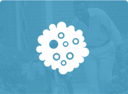 Icon of a cluster of cells with a blurred background.